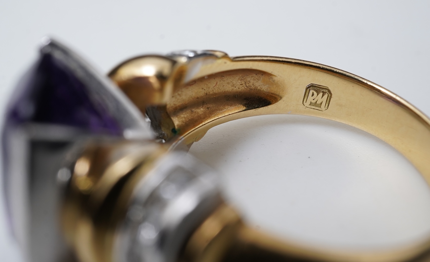 An amethyst and diamond ring